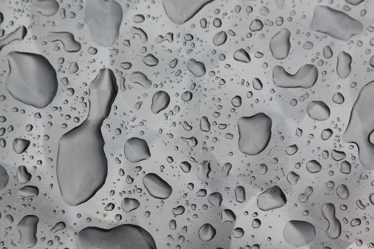 Waterdrop, table, metal — Atomic Wallet: Your Essential Tool for Crypto Management